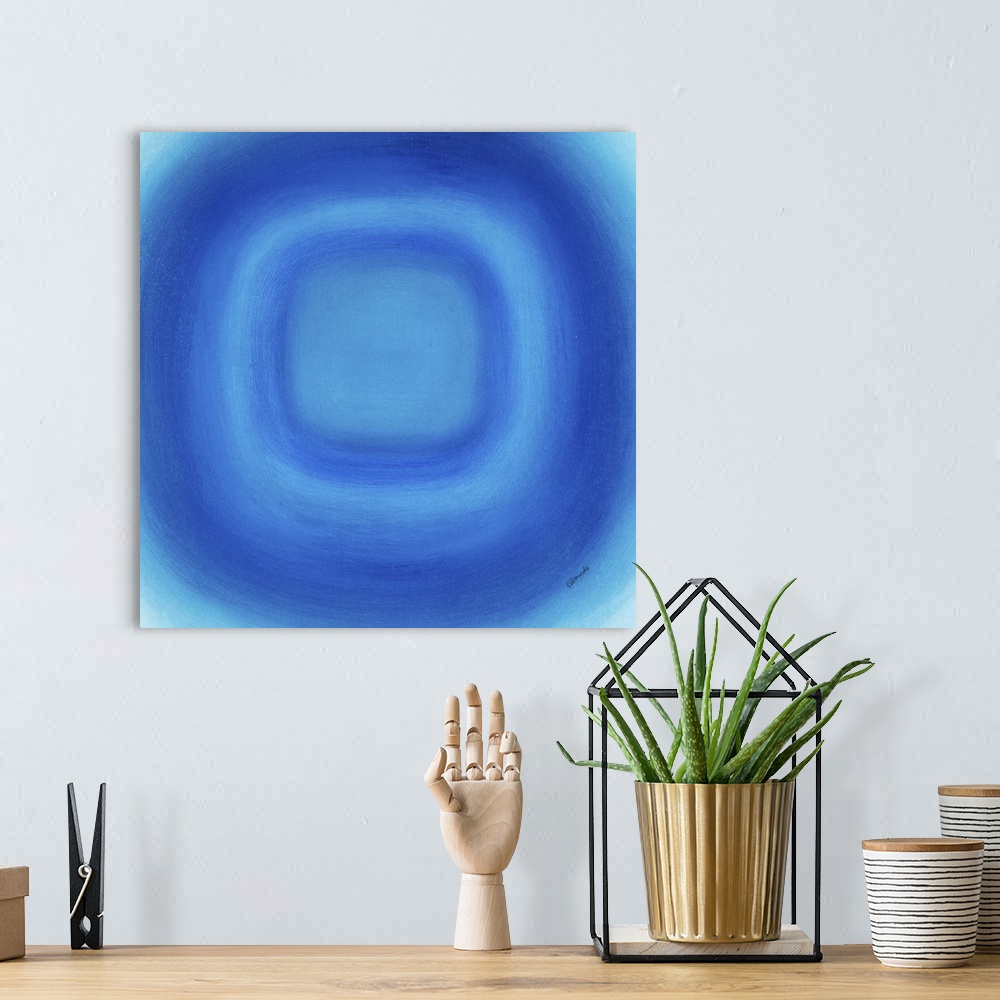 A bohemian room featuring A contemporary abstract painting of a blue circle with gradating green circles moving concentrica...