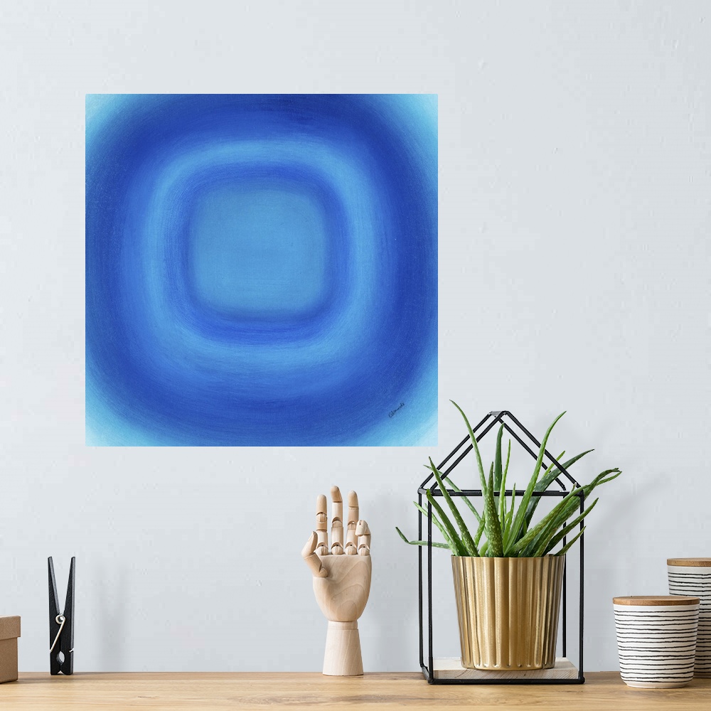 A bohemian room featuring A contemporary abstract painting of a blue circle with gradating green circles moving concentrica...