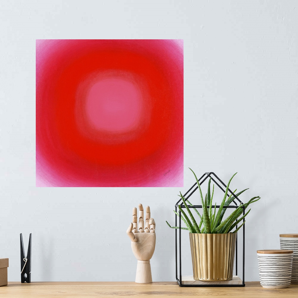 A bohemian room featuring A contemporary abstract painting of a red circle with gradating green circles moving concentrical...