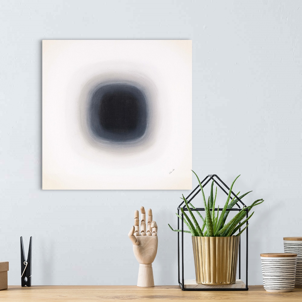 A bohemian room featuring A contemporary abstract painting of a black circle with gradating green circles moving concentric...