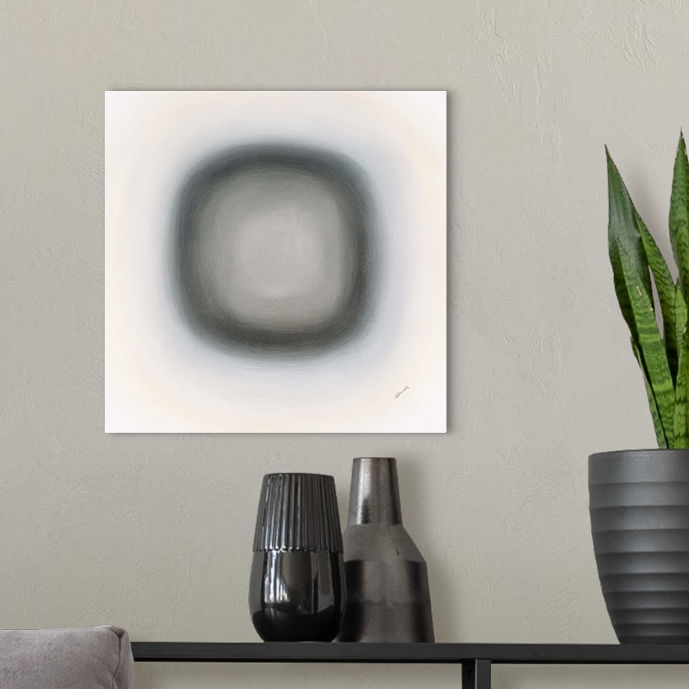 A modern room featuring A contemporary abstract painting of a gray circle with gradating green circles moving concentrica...