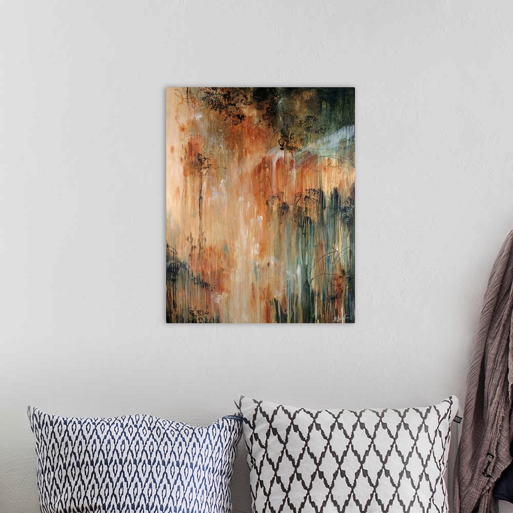 A bohemian room featuring Abstract painting of dark paint splashed and dripped on top of warm tones.