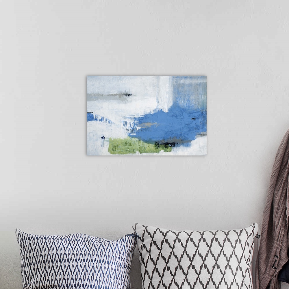 A bohemian room featuring Contemporary abstract painting using blue and light green patches against a neutral background.