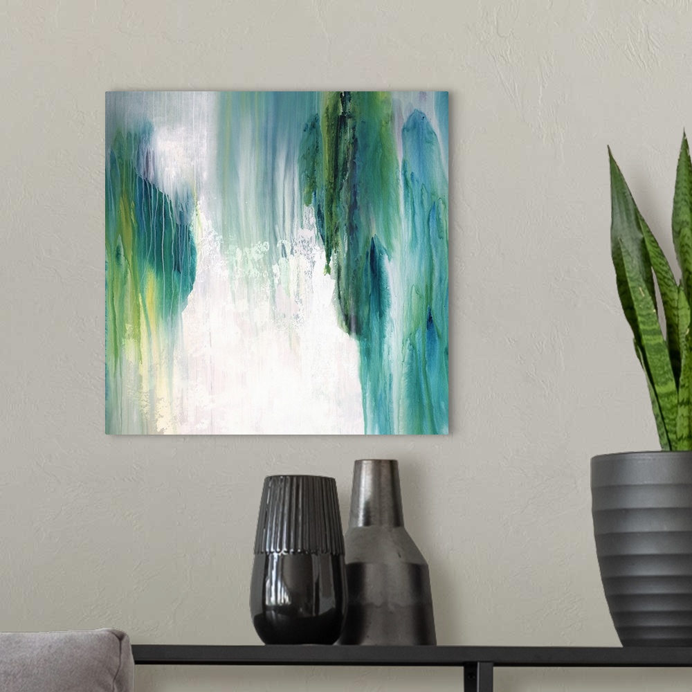 A modern room featuring Square abstract painting with shades of blue and green coming together and falling from top to bo...