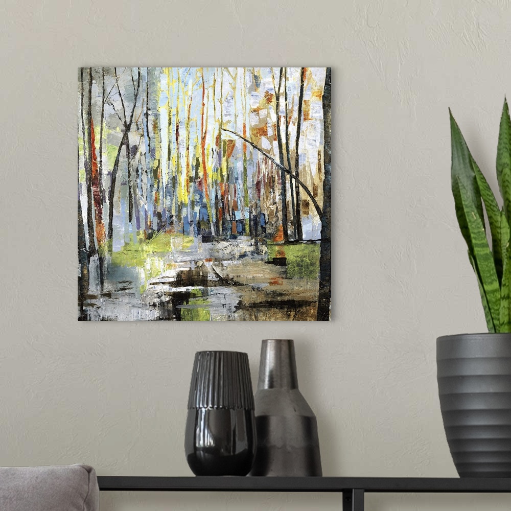 A modern room featuring Square abstract landscape with colorful bare trees in a forest setting, reaching to the top of th...