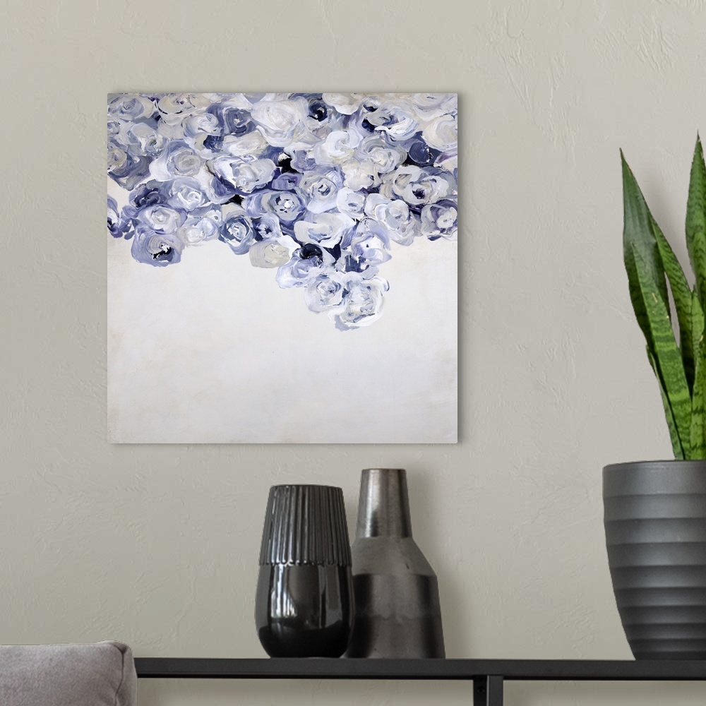 A modern room featuring Contemporary abstract painting on a neutral colored background with indigo, white, and cream circ...