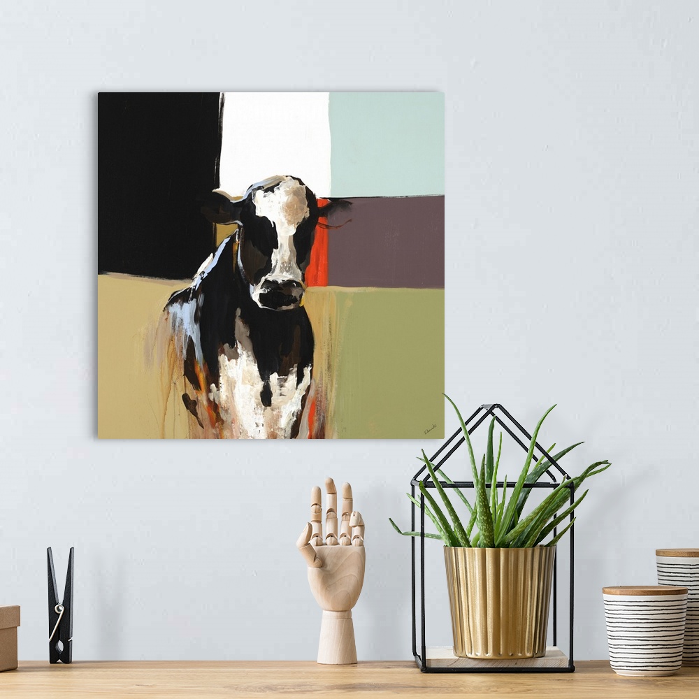 A bohemian room featuring Contemporary painting of the bust of a black and white cow, on a multicolored background of squar...