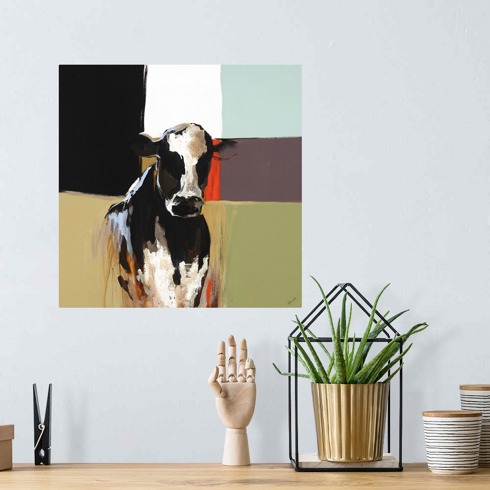 A bohemian room featuring Contemporary painting of the bust of a black and white cow, on a multicolored background of squar...