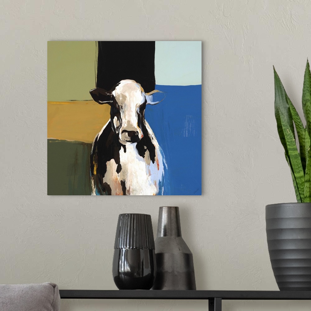 A modern room featuring Contemporary painting of the bust of a black and white cow, on a multicolored background of squar...