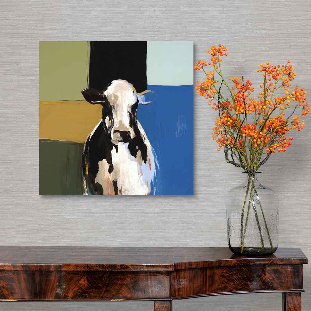 A traditional room featuring Contemporary painting of the bust of a black and white cow, on a multicolored background of squar...