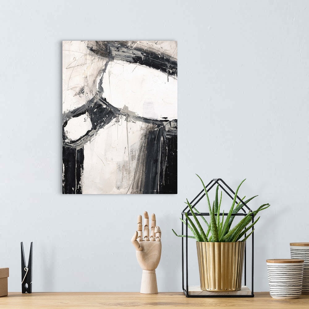 A bohemian room featuring Contemporary abstract painting in shades of black and white.