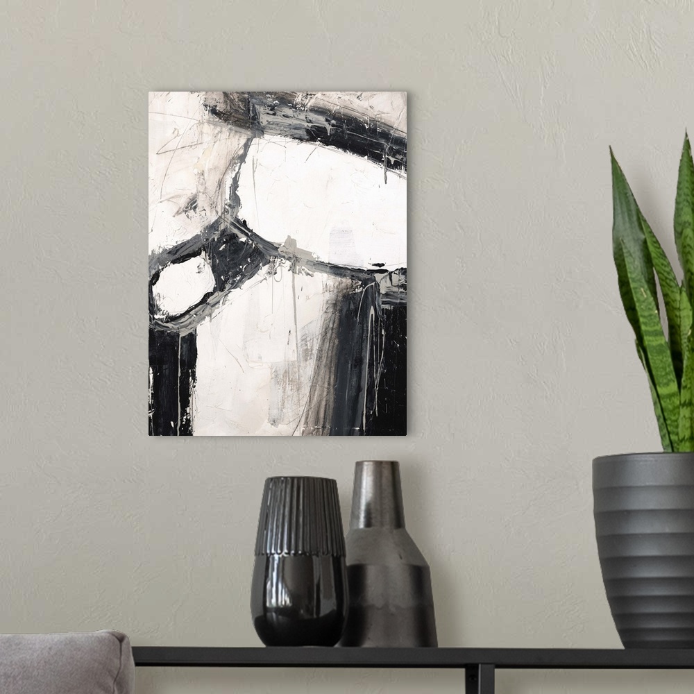 A modern room featuring Contemporary abstract painting in shades of black and white.