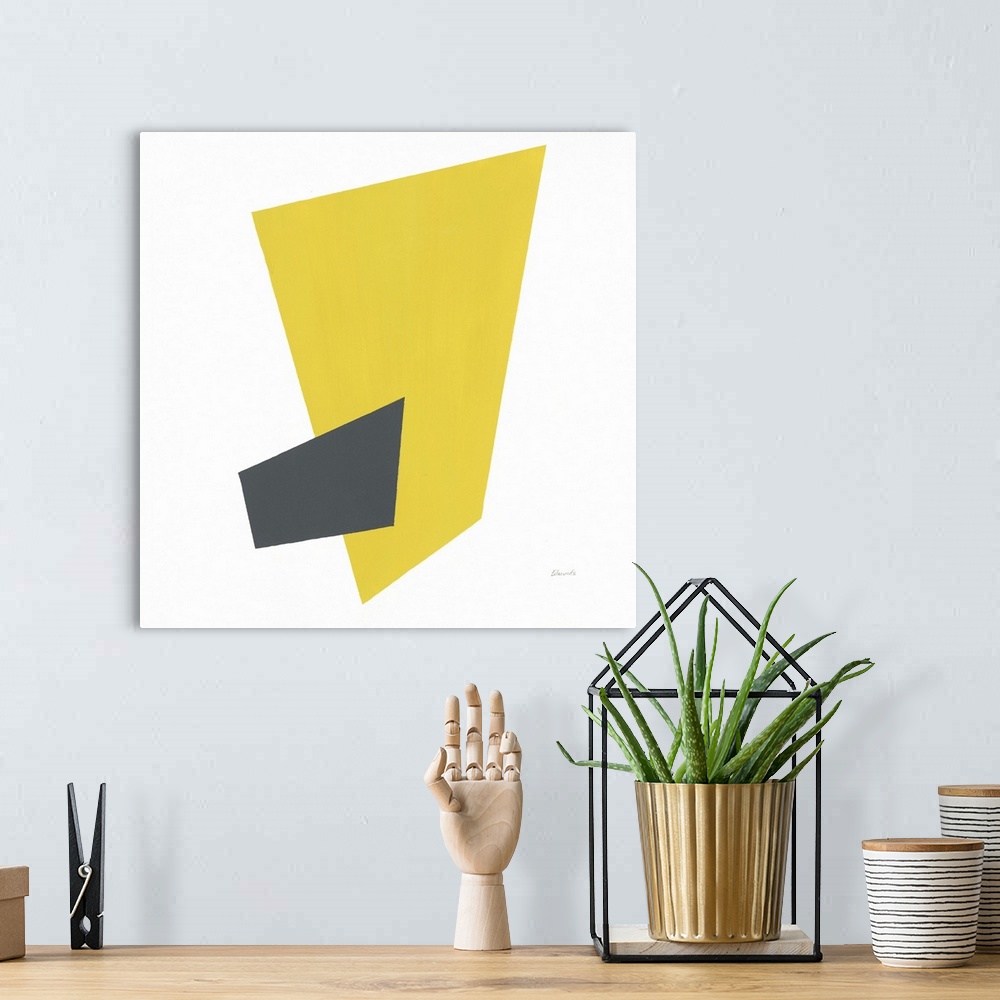 A bohemian room featuring Contemporary suprematist-style abstract artwork with a yellow and grey block intersecting.