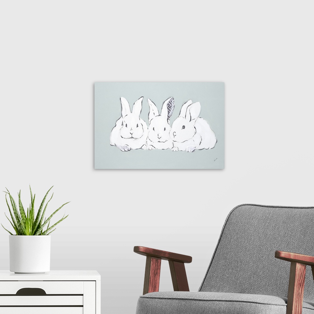 A modern room featuring A group of three white rabbits sitting side by side.