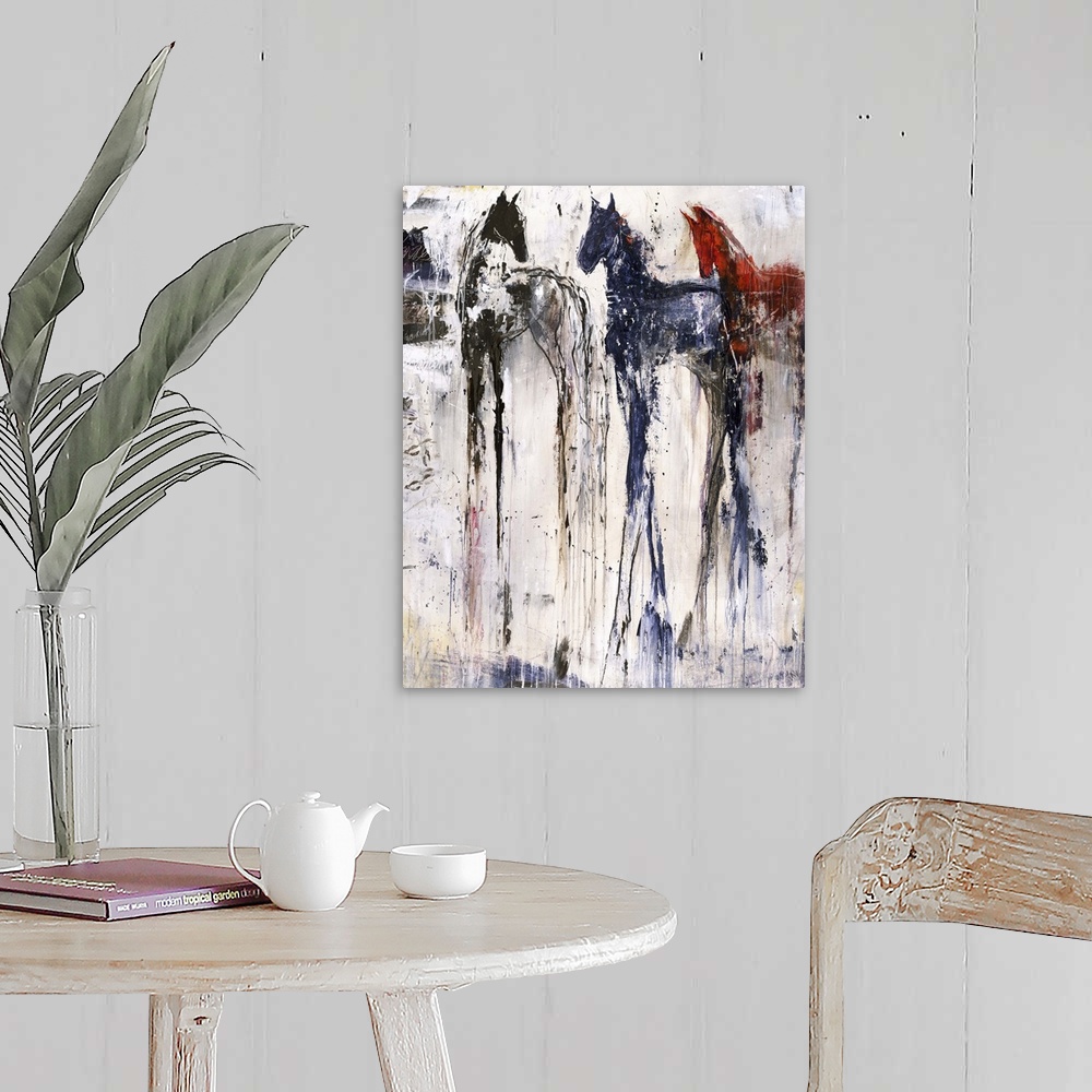 A farmhouse room featuring Tall abstract painting of three horses with vertical lines of color.
