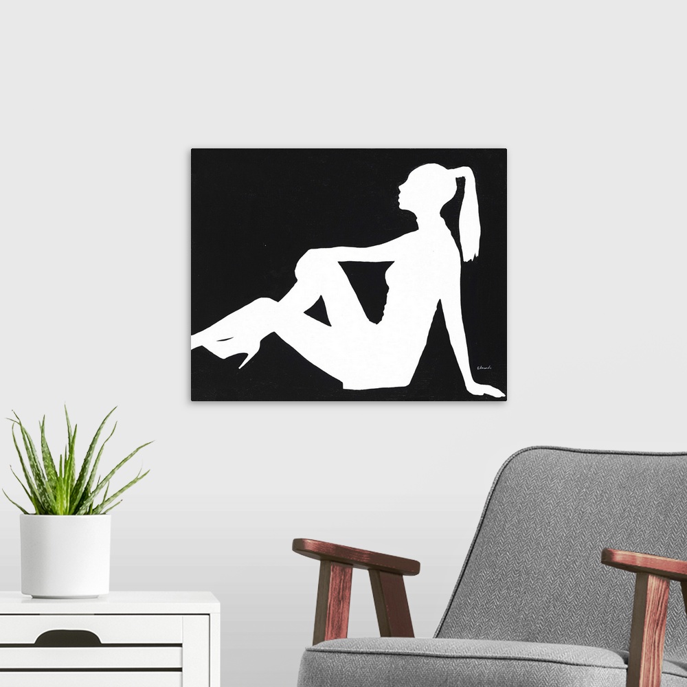A modern room featuring Contemporary painting of a silhouetted female form.