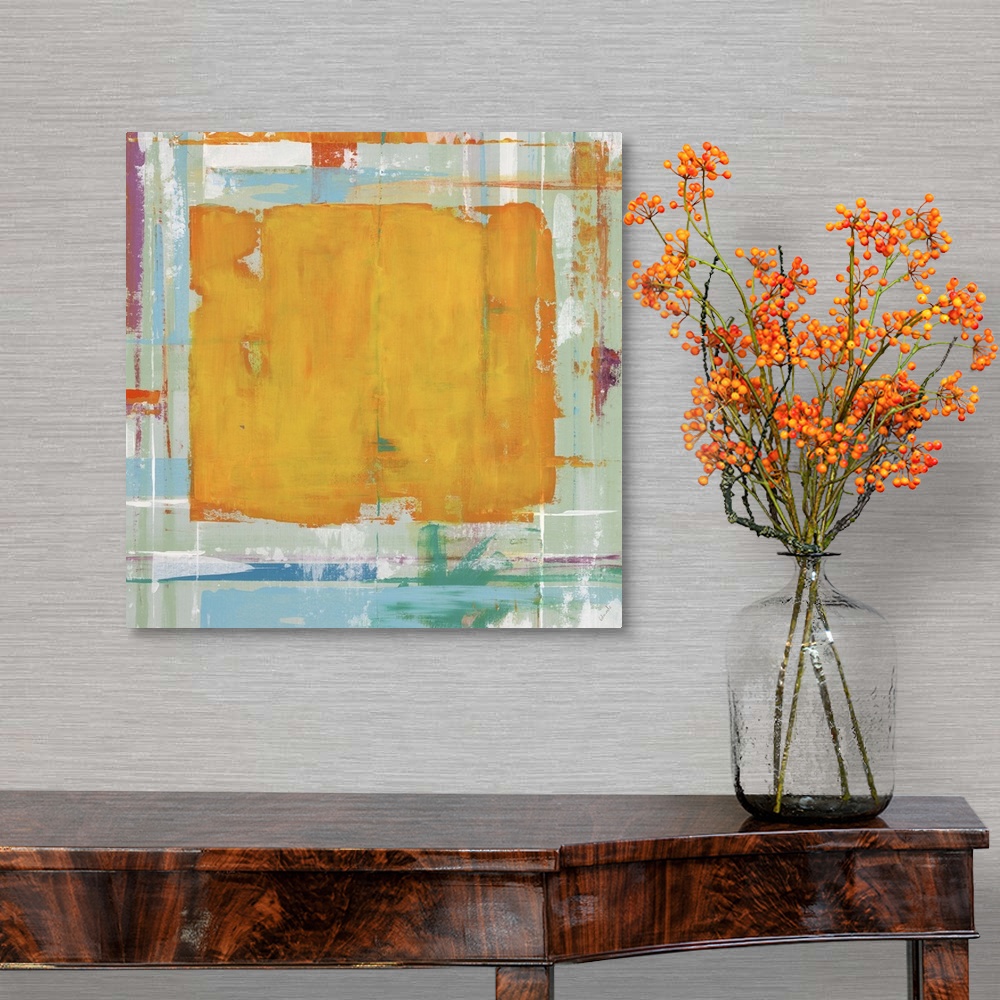 A traditional room featuring Abstract painting with an orange rectangle in the center of the image against blue and yellow col...