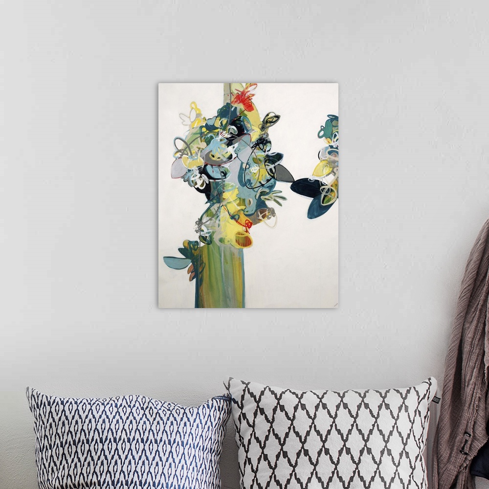 A bohemian room featuring Contemporary abstract painting colorful obscure shapes against a neutral background.