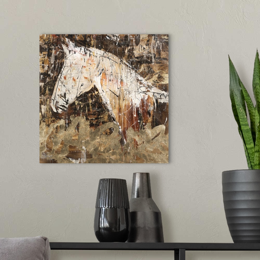 A modern room featuring Square abstract painting of a horse silhouette in shades of brown, gold, orange, and white.