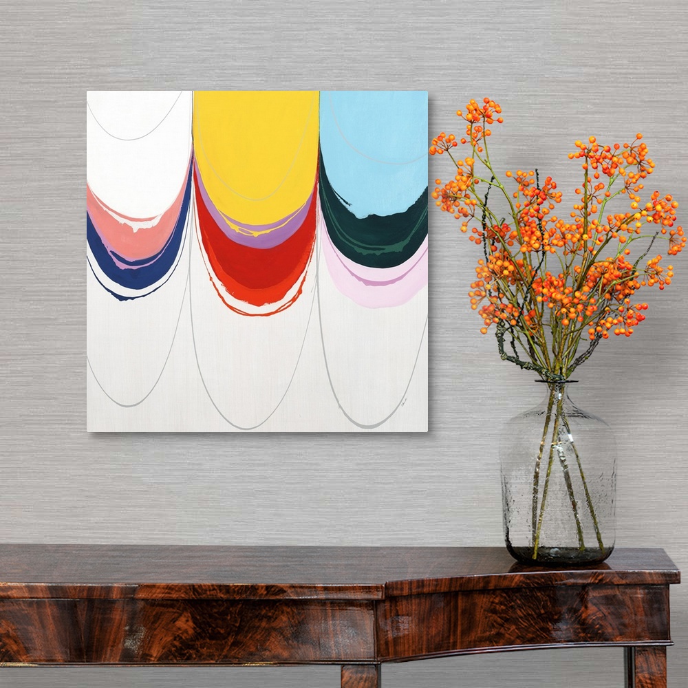 A traditional room featuring Contemporary abstract painting using bright colors dripping from the top of the image.