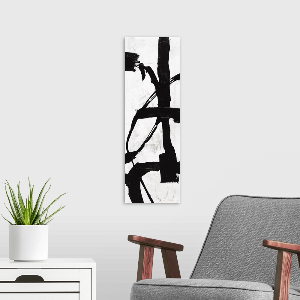 A modern room featuring Black and white abstract panel panting with bold brushstrokes creating movement up and down the c...