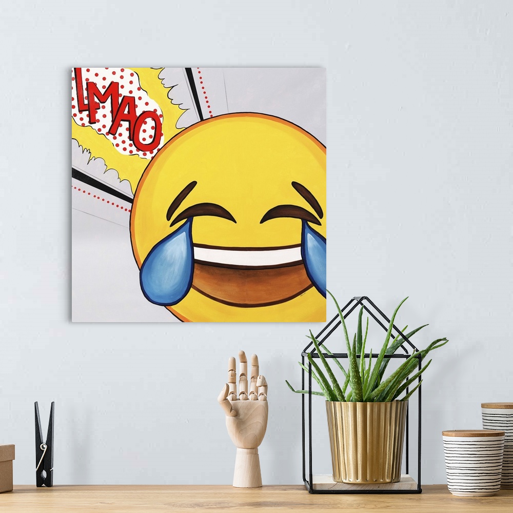 A bohemian room featuring Contemporary painting using a bright yellow pop art style smiley face in tearful laughter.