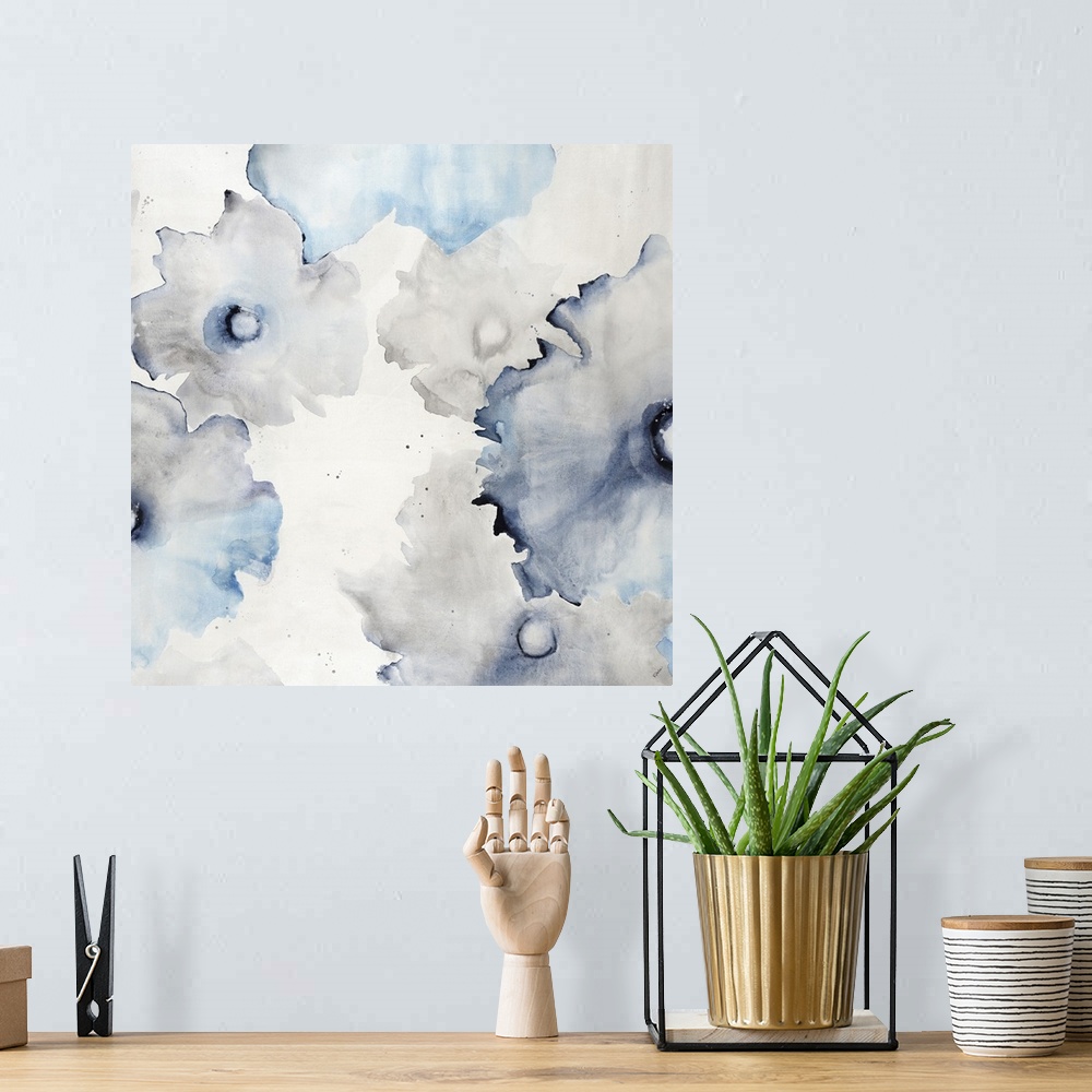 A bohemian room featuring Watercolor painting of fading gray and blue flowers on white.