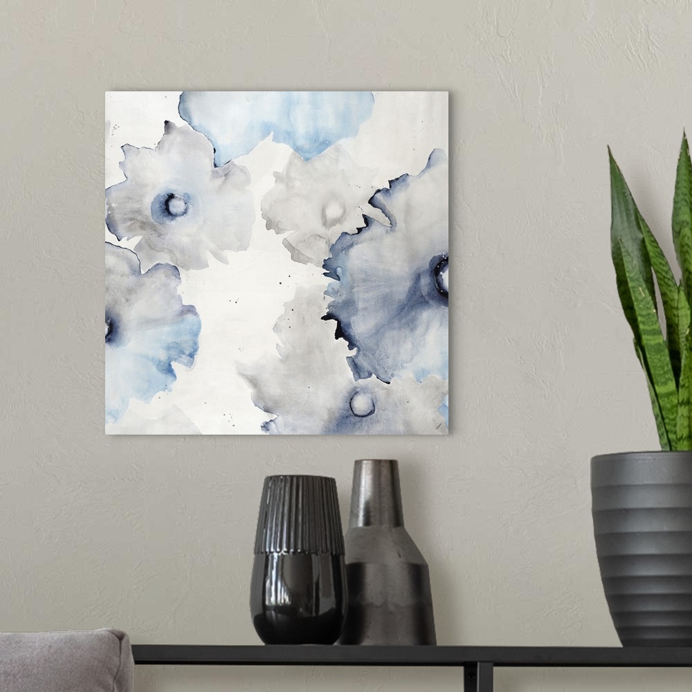 A modern room featuring Watercolor painting of fading gray and blue flowers on white.