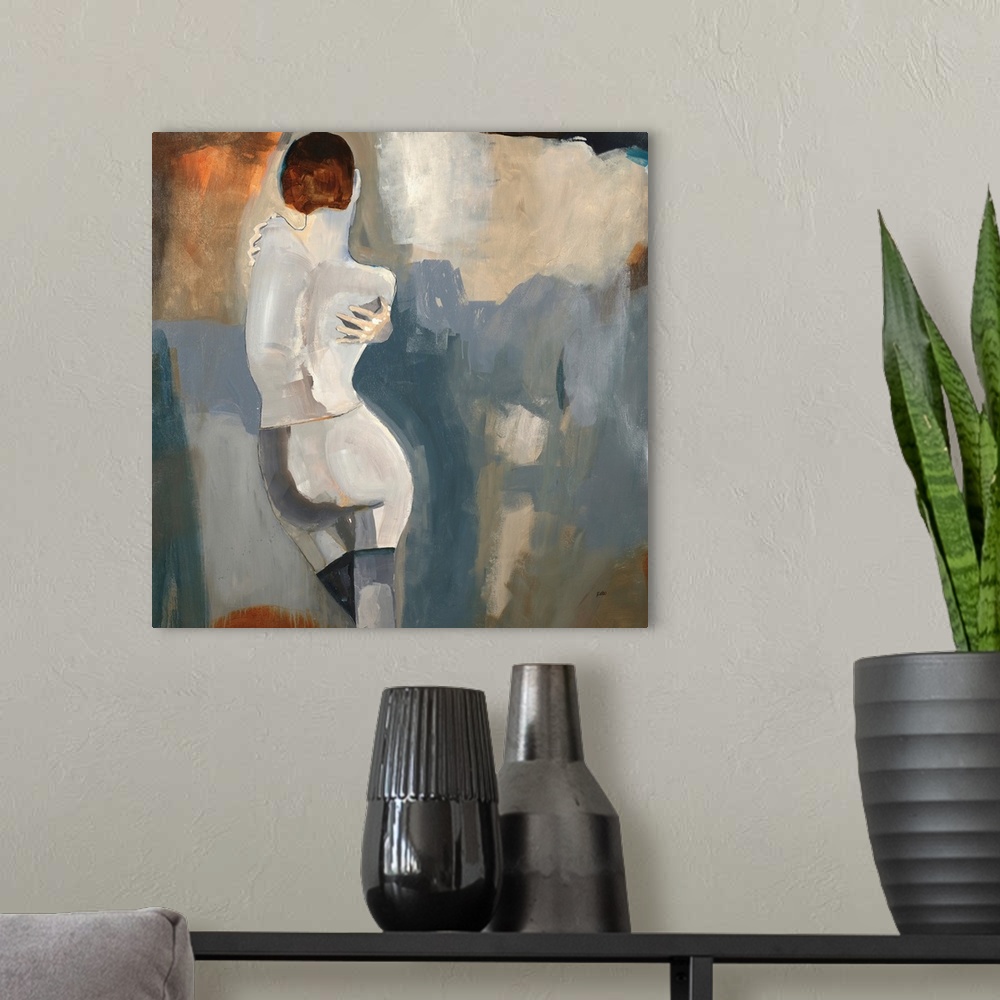 A modern room featuring Contemporary artwork of a woman wrapping her arms around herself with a background made with blue...