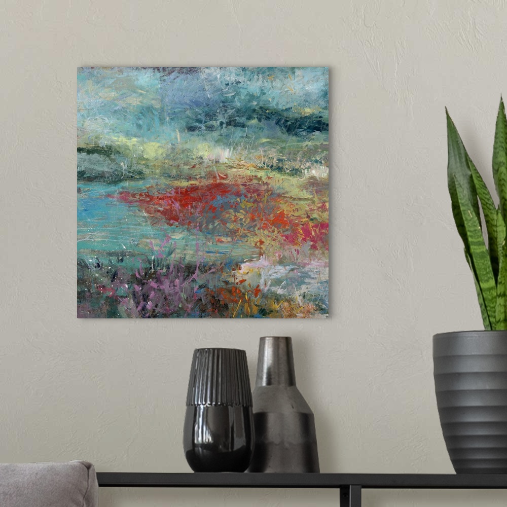 A modern room featuring Abstract painting of a vibrant field of brightly colored flowers and greenery.