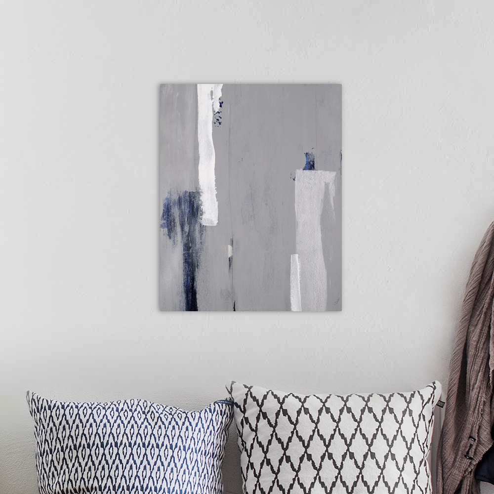 A bohemian room featuring Abstract painting of textured brush strokes in shades of gray with blue accents.