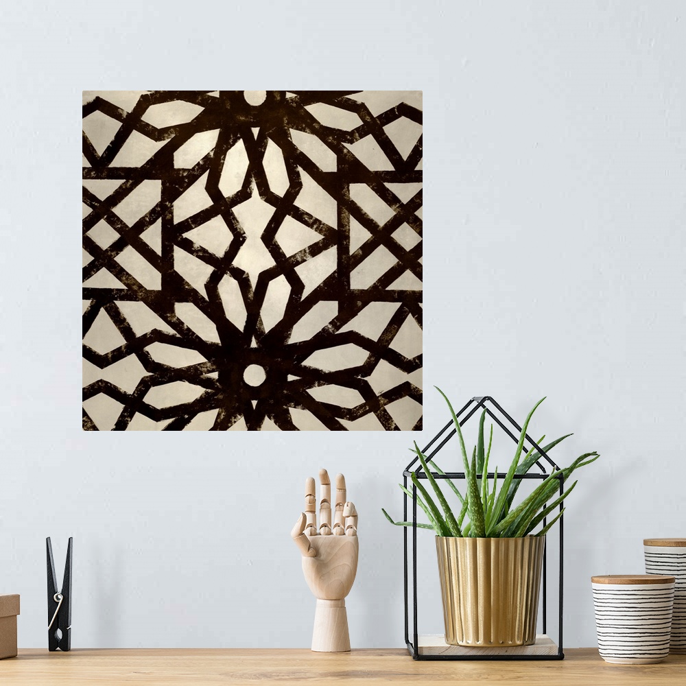 A bohemian room featuring Contemporary abstract art of iron bars making up various shapes on a canvas.