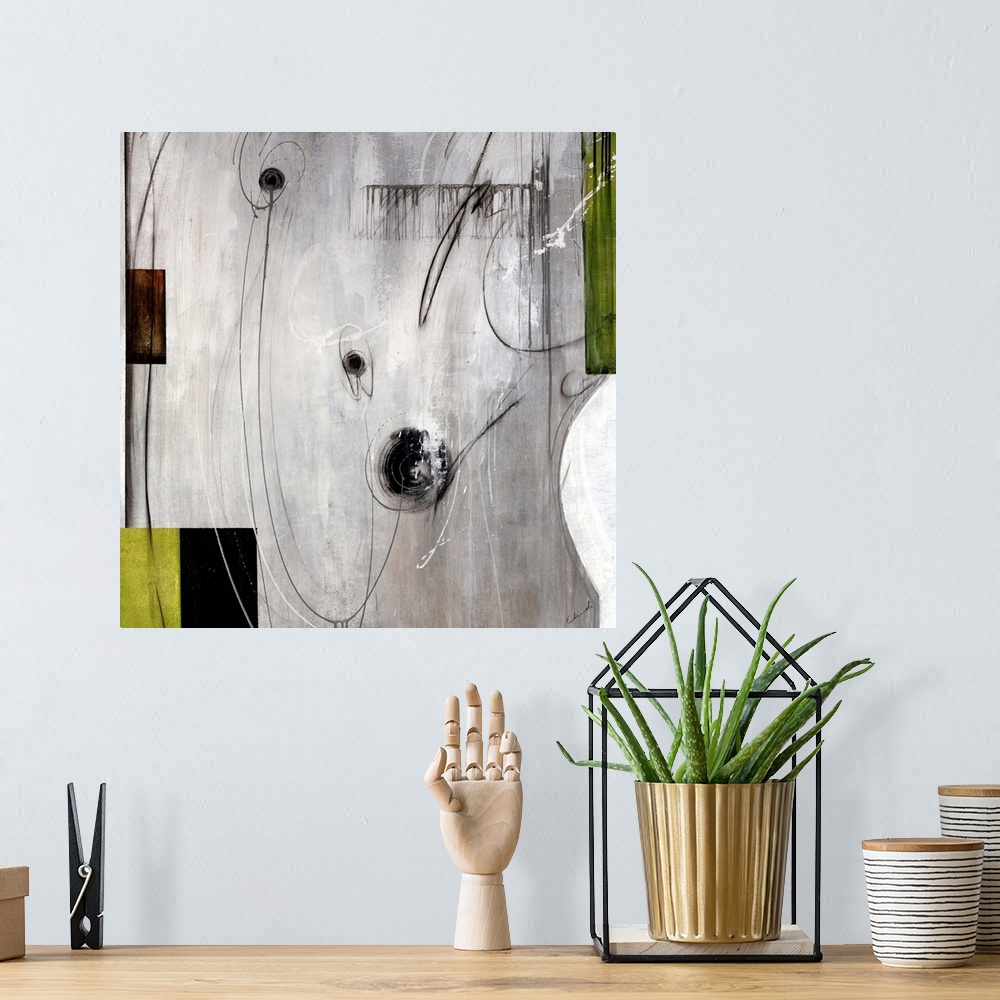 A bohemian room featuring This piece of abstract artwork has different blocks of color on the sides of the print with swirl...