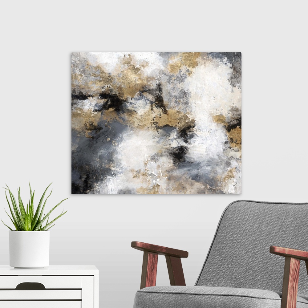 A modern room featuring Contemporary abstract artwork in shades of gold, grey, and white, resembling a stormy sky.