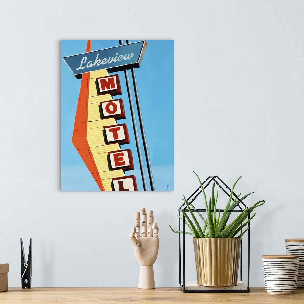 A bohemian room featuring Painting of a vintage motel sign with a diamond shaped decorative element, against a bright blue ...