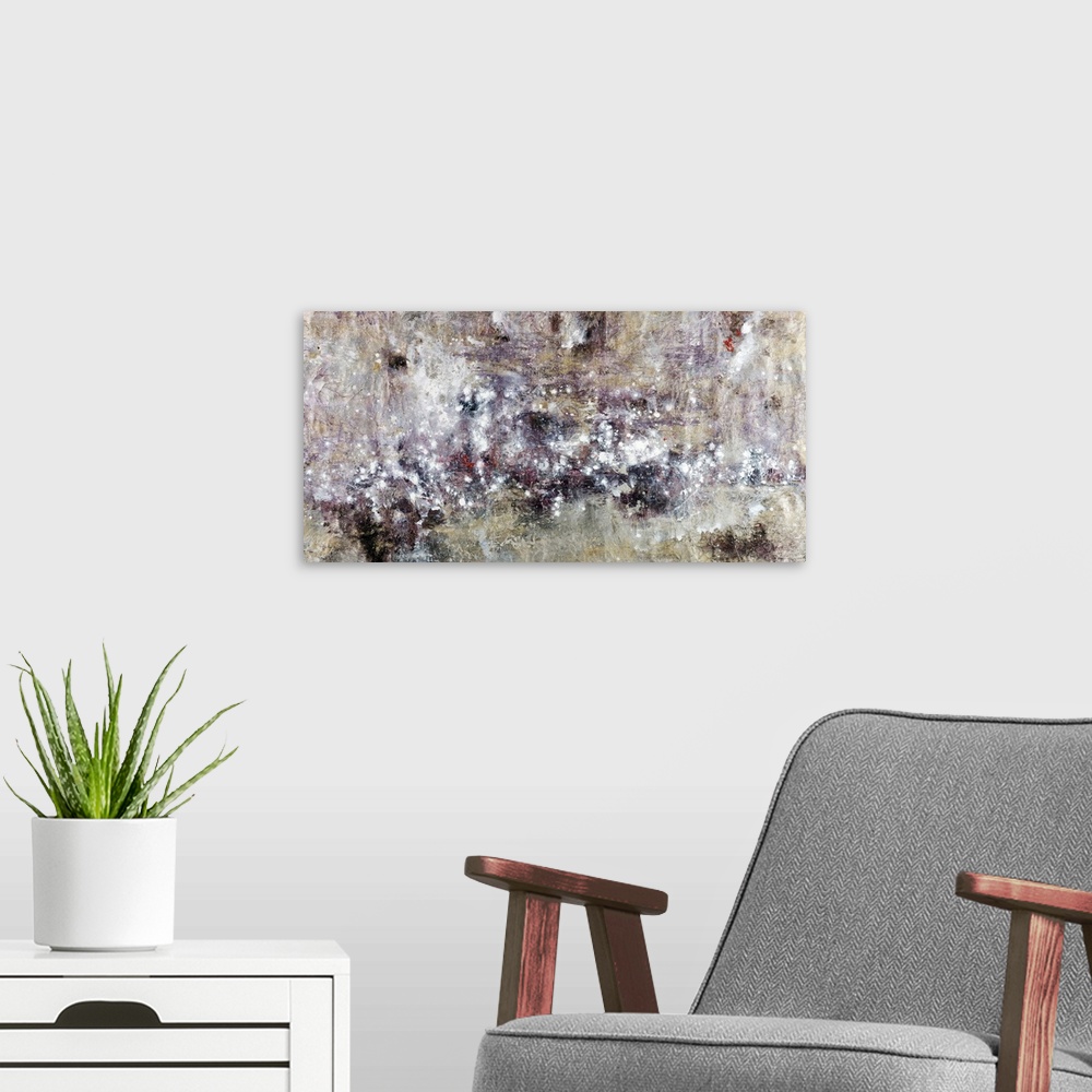 A modern room featuring Abstract artwork whose edges are neutral and white speckled throughout this horizontal piece.