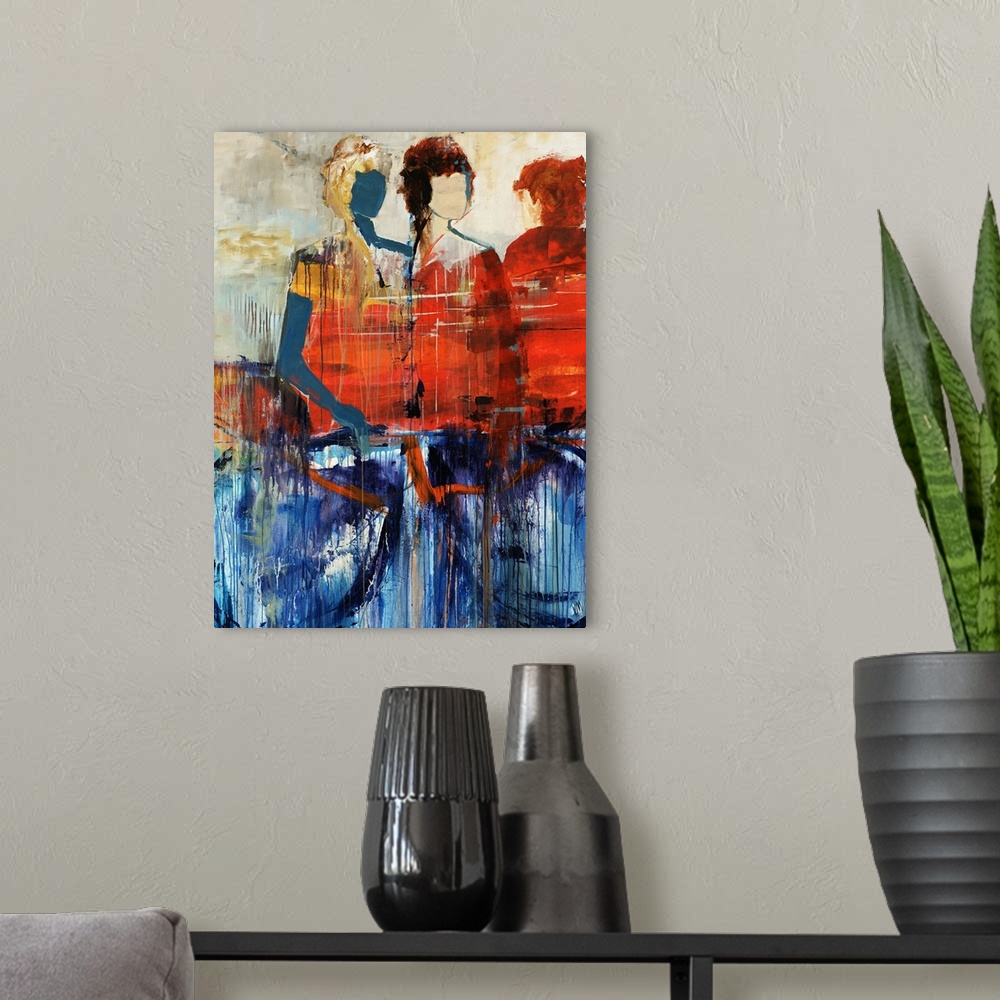 A modern room featuring Portrait, figurative art on a large wall hanging of three human figures standing behind a large o...