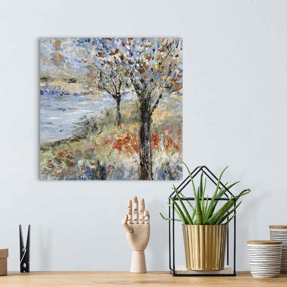 A bohemian room featuring A decorative landscape of textured brush strokes of trees and a river during spring.