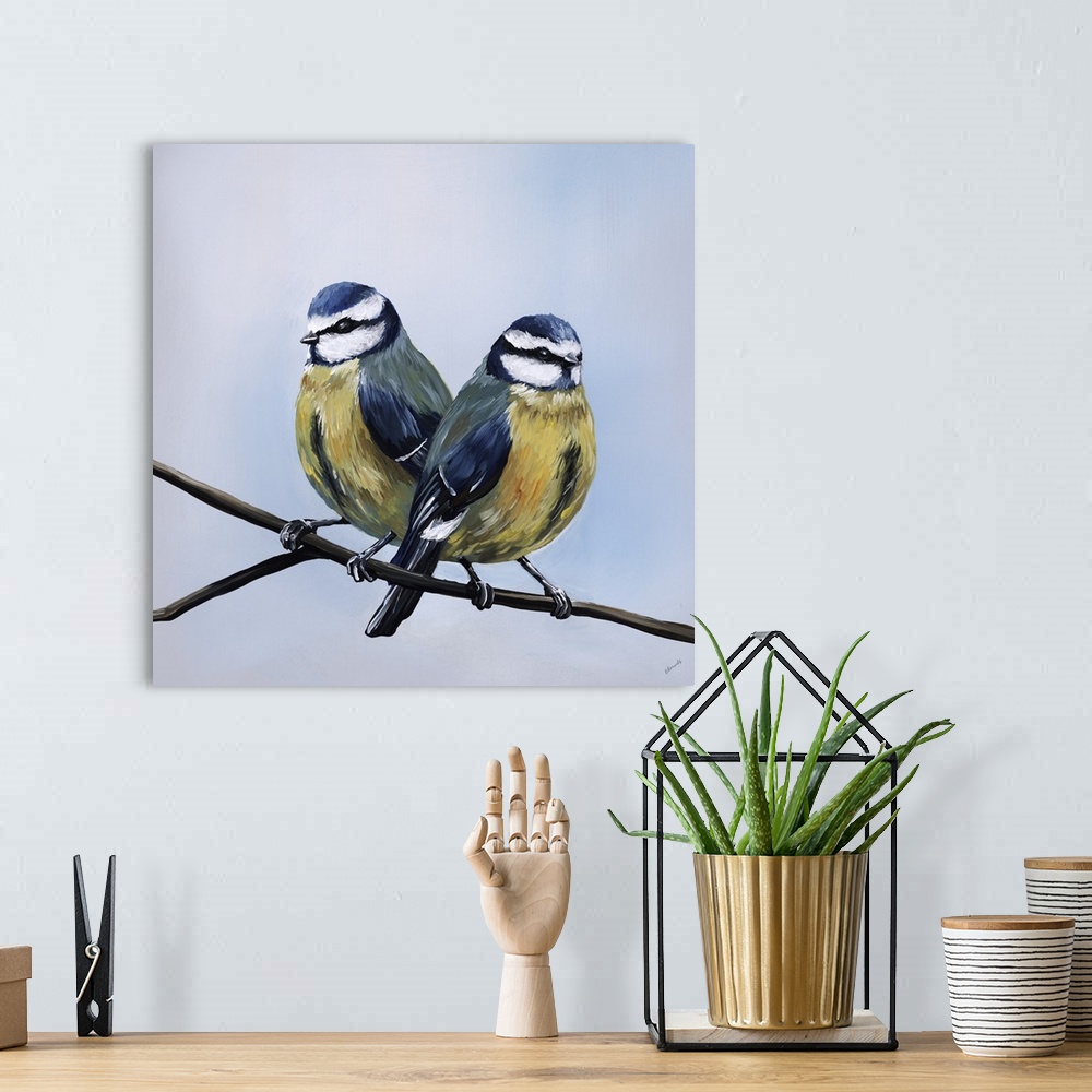 A bohemian room featuring Contemporary painting of two birds perched on a branch.