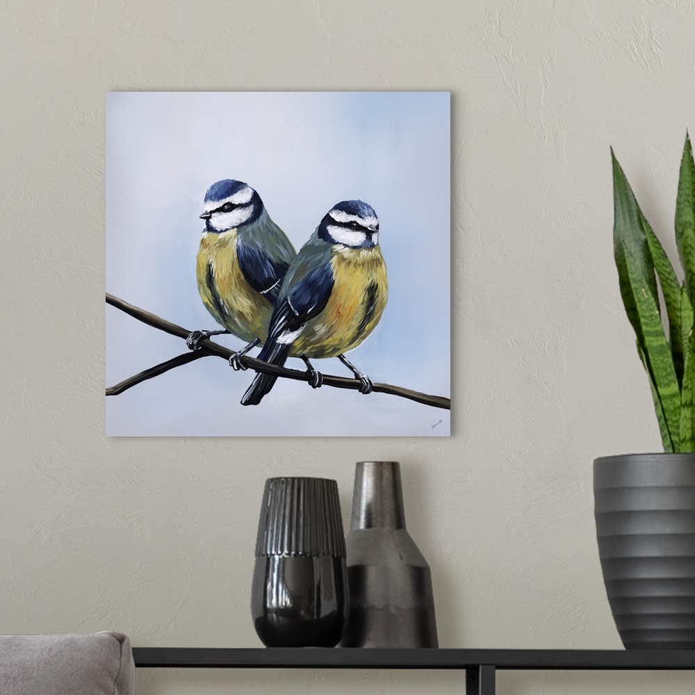 A modern room featuring Contemporary painting of two birds perched on a branch.