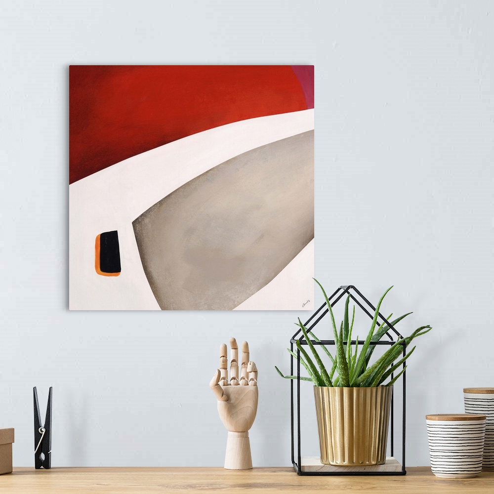 A bohemian room featuring Abstract painting of a portion of a space helmet on a warm background.