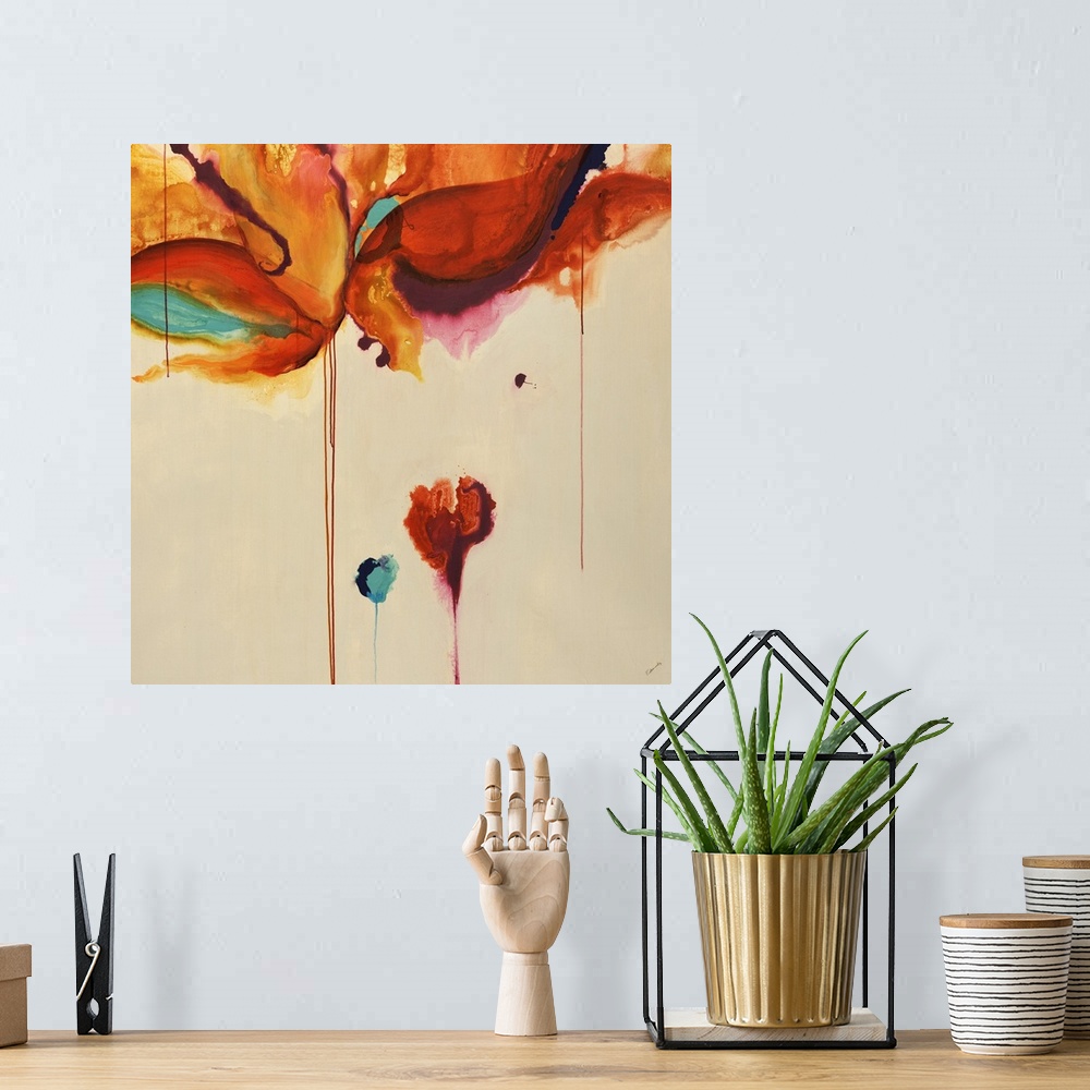 A bohemian room featuring Square contemporary abstract painting of warm color blobs with color dripping down from them.