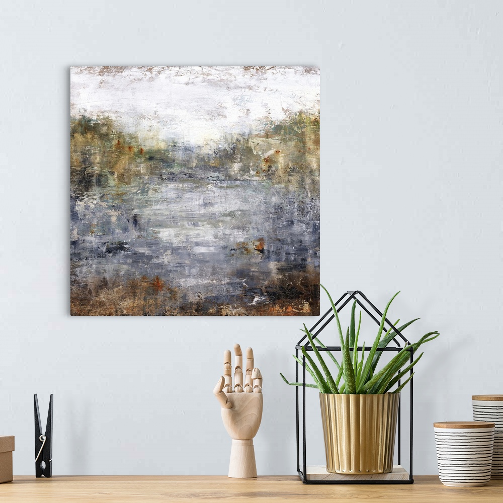 A bohemian room featuring Square abstract landscape of a lake with a line of Autumn colored trees in the background.