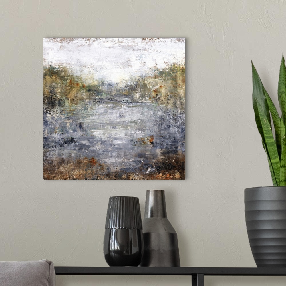 A modern room featuring Square abstract landscape of a lake with a line of Autumn colored trees in the background.