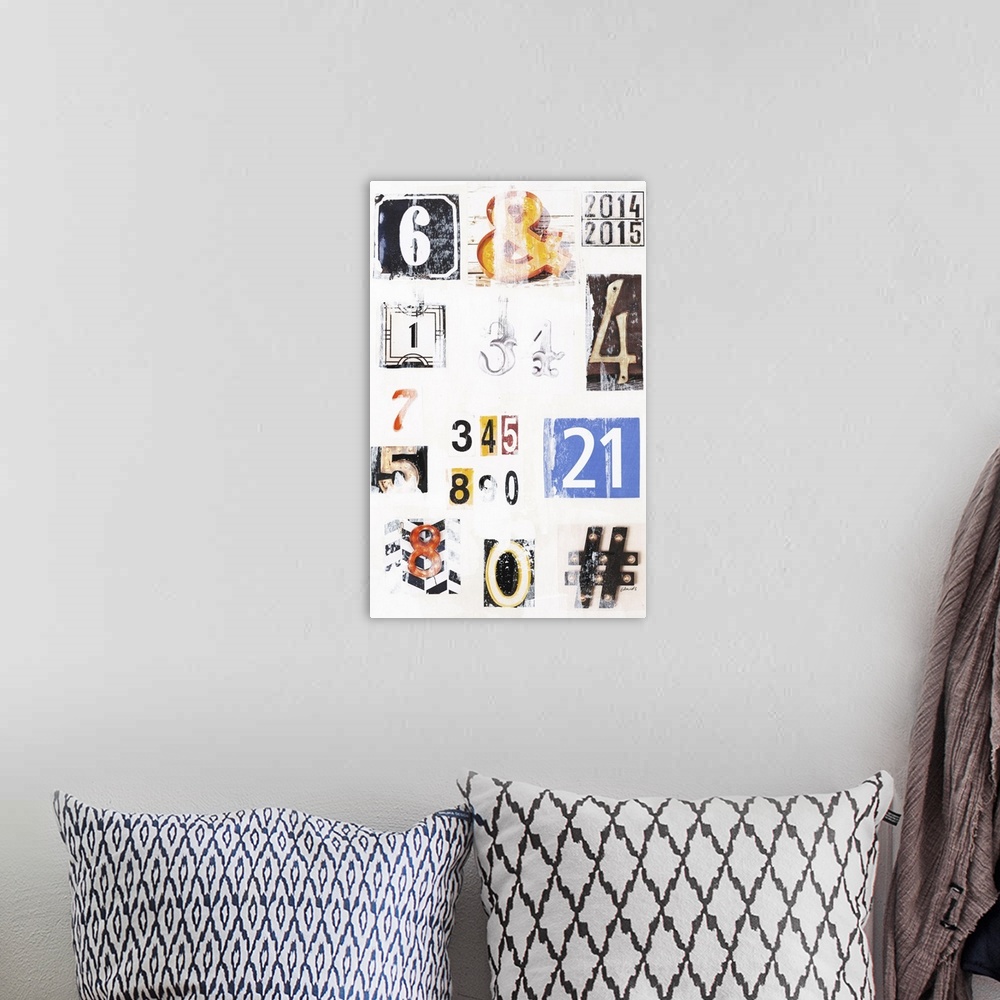 A bohemian room featuring Contemporary art with uniquely designed numbers and signs with a vintage feel on a white background.