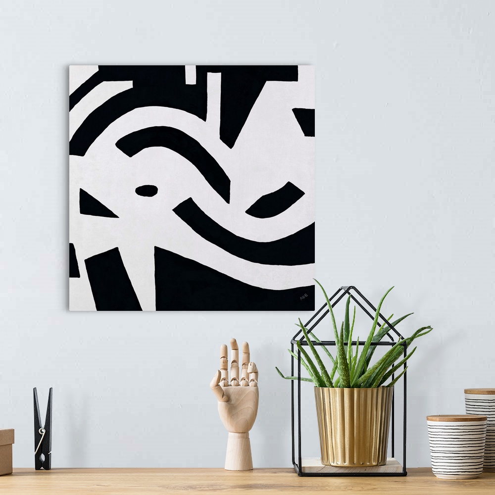 A bohemian room featuring Black and white abstract painting with flowing movement all over the square canvas.