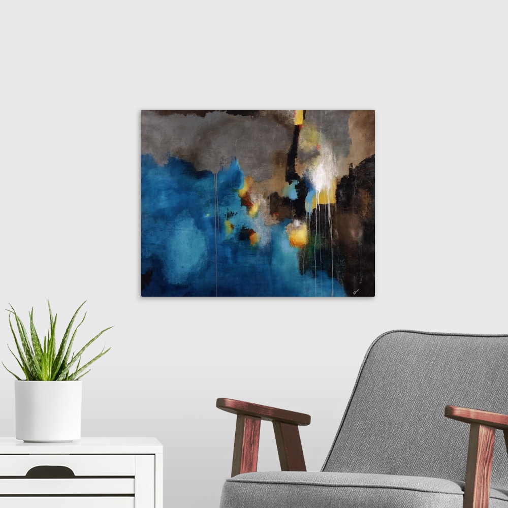 A modern room featuring Abstract painting using bright blue toward the bottom of the image with light earthy tones toward...