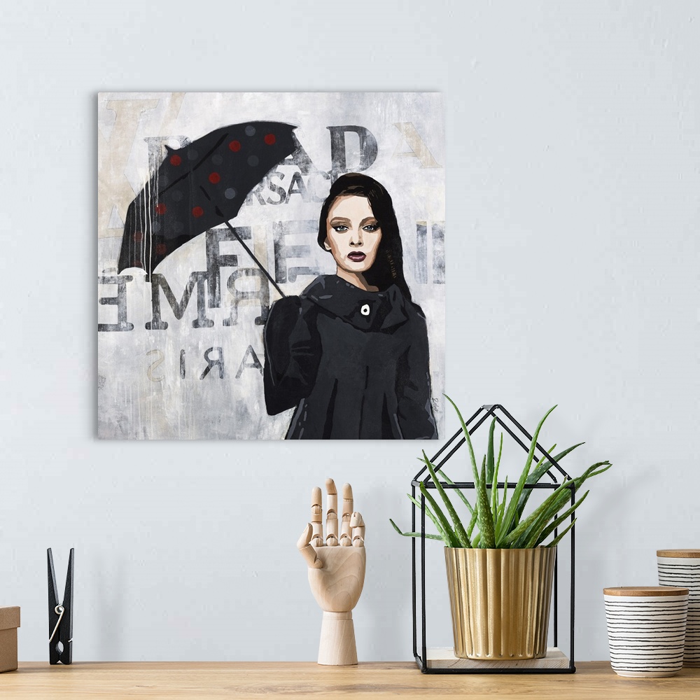 A bohemian room featuring Square artwork of a woman wearing a black rain coat and carrying a polka dotted umbrella with a g...