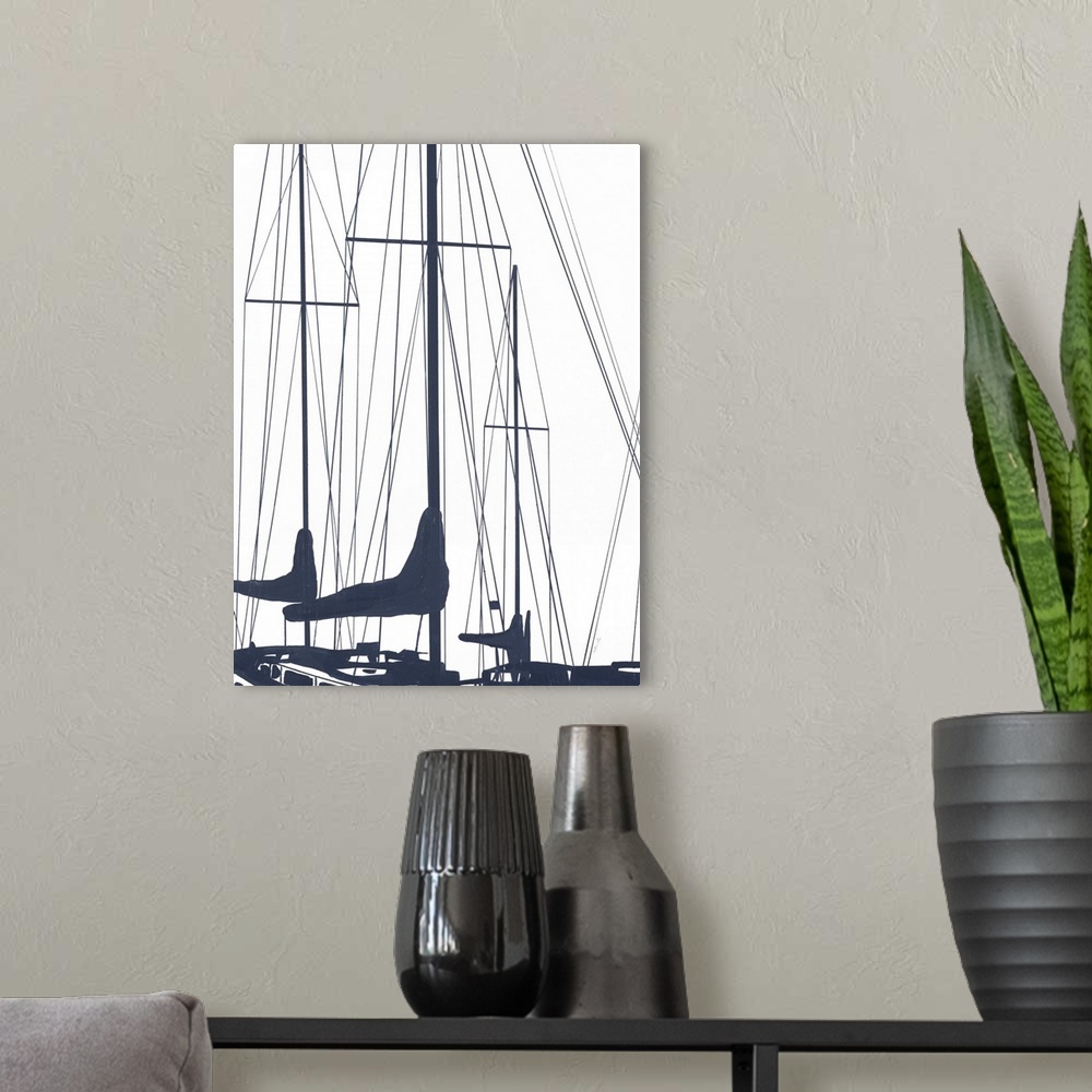 A modern room featuring A subdued design in white and dark blue of the masts of a couple of sailboats floating in the water.