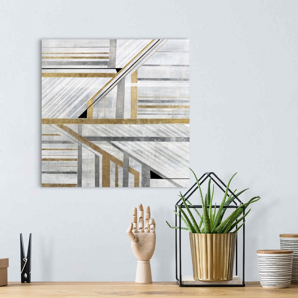 A bohemian room featuring Geometric abstract art with silver, white, and gold lines and angles coming together to create mo...